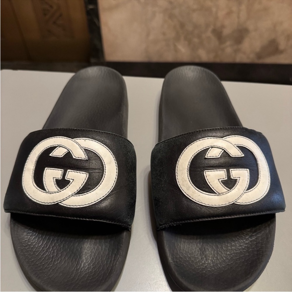 Gucci Black and White Slide Sandals with Embossed Logo